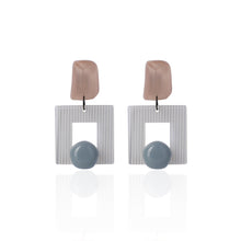 Load image into Gallery viewer, Morandi pink handcrafted earrings on white background
