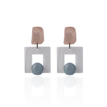 Load image into Gallery viewer, Morandi pink handcrafted earrings on white background
