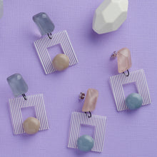 Load image into Gallery viewer, Morandi pink and blue handcrafted earrings on purple background
