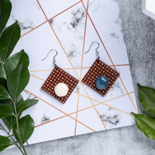 Load image into Gallery viewer, white and blue dots with milk chocolate cookie square handcrafted earrings on marble background
